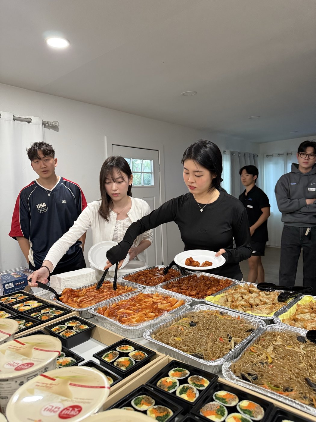 Trays of Korean dishes at a UCLA gathering